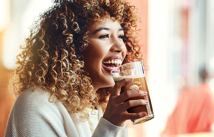 Student Holding Starbucks Chameleon Beverage